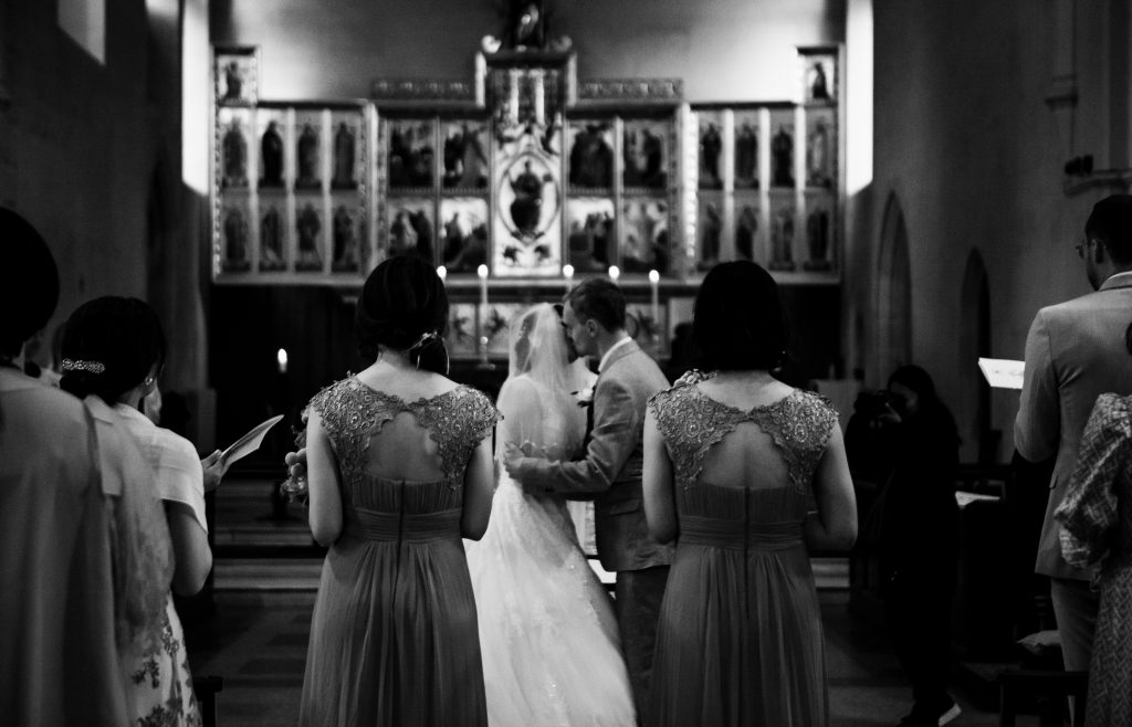 Bride and groom kiss