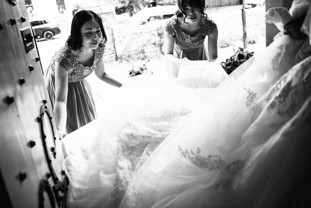 bridemaids fluffing dress