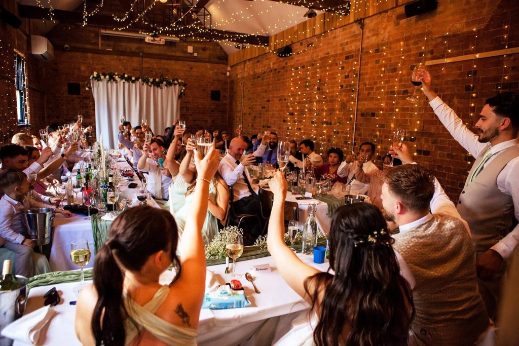 wedding guests cheers